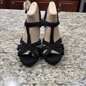 Thalia Sodi black high heels